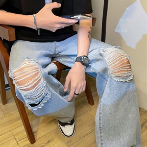 新款男女高街破洞宽直筒个性潮牌牛仔裤长裤子NZ689 批45 控68图片