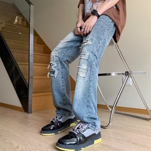 新款男牛仔裤男修身小脚裤弹力潮流破洞裤青年春秋长裤图片