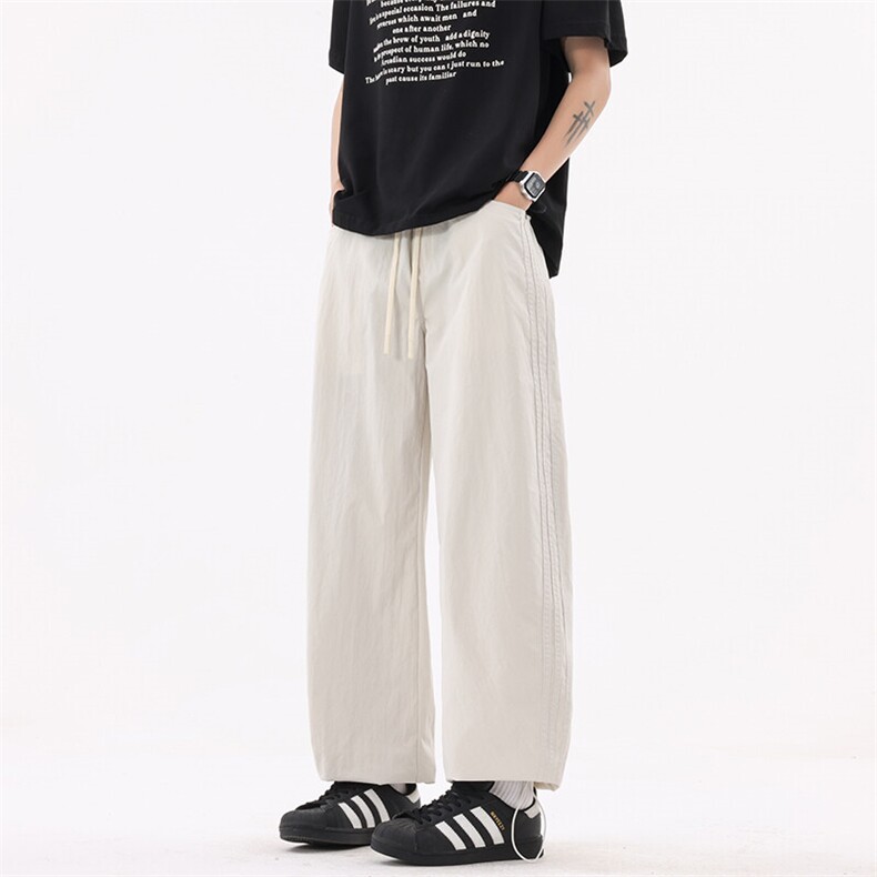 B353 25678 P55 夏季新款冰丝皱弯刀条纹裤裤大口袋男士休闲裤 杏图片