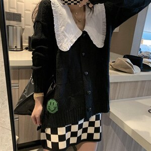 娃娃领开衫图片