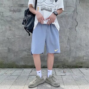 218-1-P18-GG02夏季宽松休闲打勾菊花潮牌开叉短裤图片