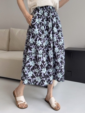 梦幻黑底紫蓝色碎花半身裙女夏季2025新款松紧腰全棉a字花苞裙子，女装半身裙，缘衣格