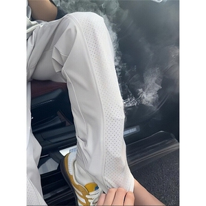 斜切弯刀冰丝裤子男夏薄款激光打孔速干裤微喇直筒休闲裤 KM566图片