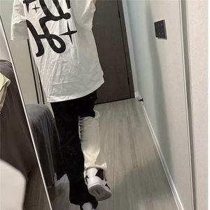 美式vibe高街黑白拼接撞色牛仔裤男女新款显瘦破洞宽松直筒长裤子图片