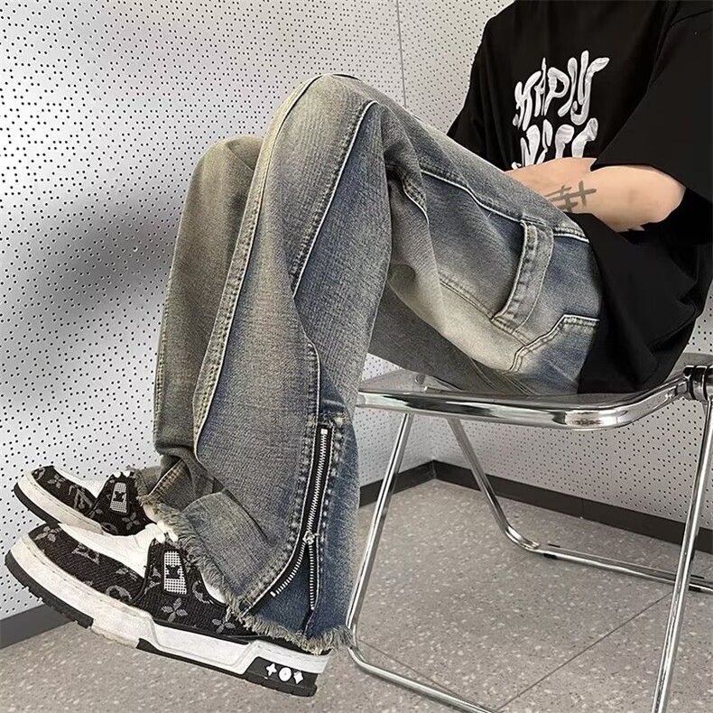 春款牛仔裤男欧美高街vibe裤子宽松直筒拉链开叉毛边微喇裤图片