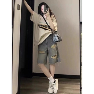 美式街头破洞牛仔短裤男女夏季水洗旧vintage裤子设计毛边五分裤图片