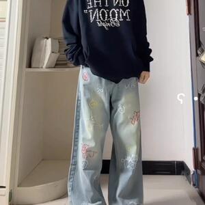 工装卡通印花牛仔裤男女款秋冬美式高街设计感裤子直筒弯刀微喇裤图片