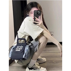 美式街头破洞牛仔短裤男女夏季水洗旧vintage裤子设计毛边五分裤图片