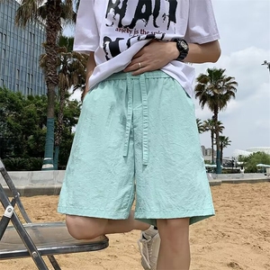 休闲运动沙滩短裤男潮牌篮球训练速干oversize4分裤子夏图片