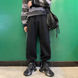 2021夏季新束脚休闲裤港风男条纹印花大码学生九分运动卫裤K69P40图片