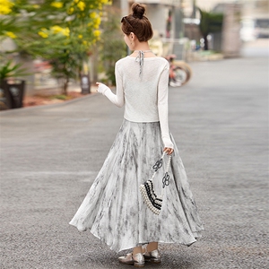 度假风水墨连衣裙2025春季新款收腰显瘦法式吊带裙气质开衫两件套图片