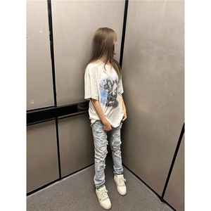 设计款破洞牛仔裤男修身小脚2025秋冬季新款潮流印花休闲裤子