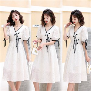 2023年新款夏装连衣裙淑女印花盘扣蝴蝶结纯色时尚潮流气质连衣裙图片