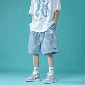 夏季冰丝薄款花短裤宽松新款潮牌休闲青少年五分速干沙滩裤图片