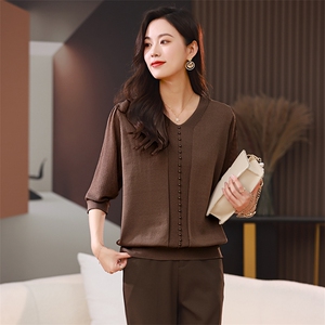 时尚优雅九分袖珍珠装饰上衣 显瘦修身V领女装卫衣图片