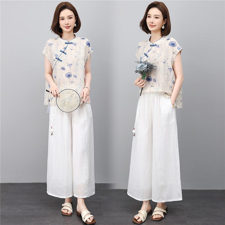 时尚夏季薄款2026新款苎麻大方得体低圆领刺绣优雅范上衣,女装套装/套裙,江忆布依