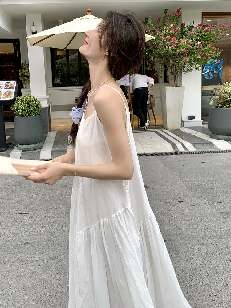 2025年夏季不规则清新甜美文艺/优雅吊带连衣裙大摆裙,女装连衣裙,诺蝶