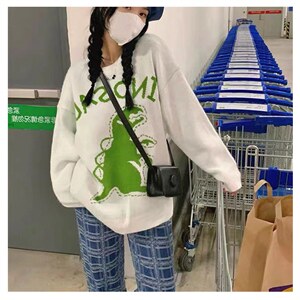 杨泡泡黑色恐龙毛衣女秋季新款宽松韩版慵懒风设计感套头针织上衣图片