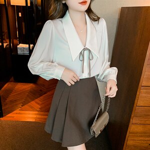 春装白色大尖领衬衫长袖上衣通勤设计感小众复古衬衣图片