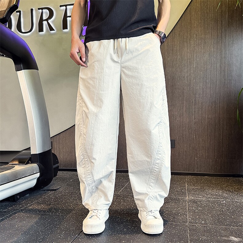 K20532-P68  夏季薄款结构拼接休闲裤男潮流宽松直筒弯刀裤速干裤图片