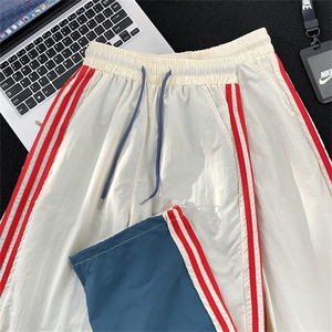 高品质 夏款男冰丝褶皱三条杠条纹拼色直筒抽绳冲锋长裤h605 P40图片