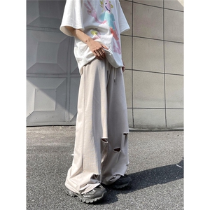 粉色破洞裤男女秋季新款美式高街阔腿拖地裤潮牌休闲垂感运动长裤图片