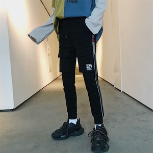 2021社会小伙弹力修身小脚裤织带黑色休闲长裤子男864/P50图片