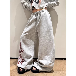 美式慵懒休闲 ??星星印花抽绳弯刀卫裤男女宽松百搭拖地长裤图片