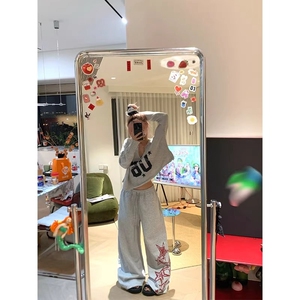 美式慵懒休闲 ??星星印花抽绳弯刀卫裤男女宽松百搭拖地长裤图片