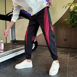 春秋潮流男士拼接束脚休闲裤百搭松紧腰弹力小脚裤撞色图片