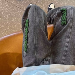 新款无品牌bf街头风嘻哈涂鸦直筒白色牛仔裤潮流简约日系百搭慵懒图片