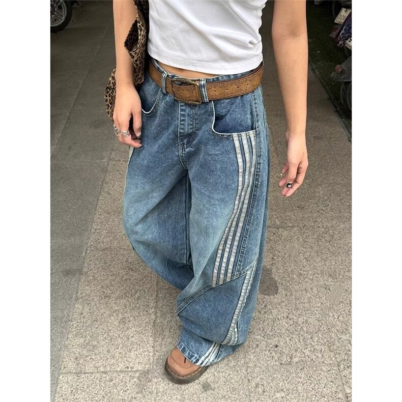 水洗解构弯刀牛仔裤女高街条纹拼接宽松显瘦休闲阔腿裤子NZY601图片