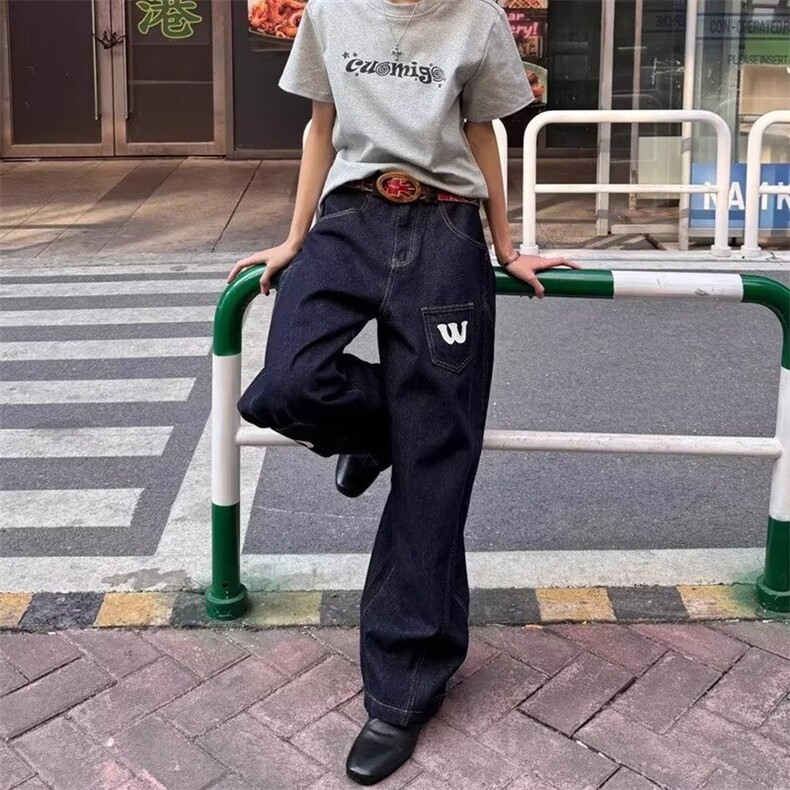 原版质量蓝色弯刀牛仔裤图片