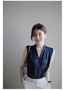简约通勤韩版v领针织背心女薄款宽松休闲精纺细羊毛无袖打底衫潮图片