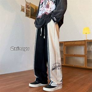 XZ616秋季新款麂皮绒拼接休闲裤TY395P65控75,黑色花苞短裤如何搭配图片