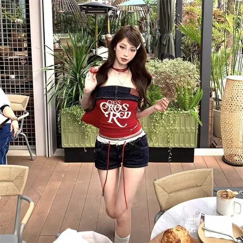 辣妹性感撞色拼接牛仔超短裤女夏季美式设计感低腰系绳毛边热裤子图片