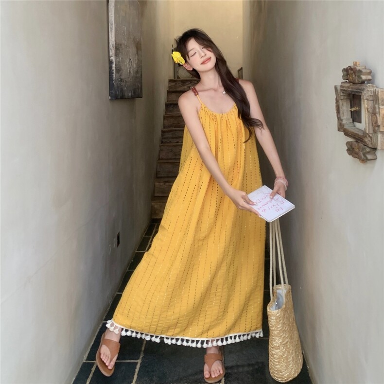黄色流苏吊带连衣裙女2025夏季新款高级感超好看海边度假气质长裙图片