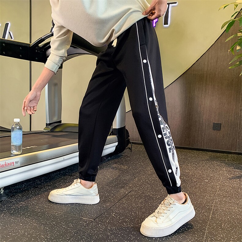 秋季新款运动休闲裤排扣设计感印花字母拼接痞帅男裤W03-P58控79，男装休闲裤，电商D323（原B261）