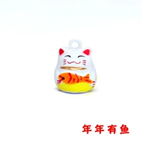 Держа рыбы и богатства кошки