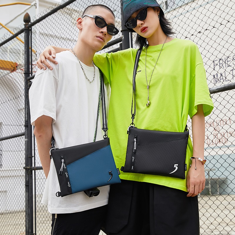 One shoulder messenger bag men's backpack student sports tide brand leisure street trend hip hop Korean IPAD clutch bag