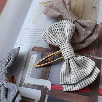 The Zero Waste Project hand-sews pure linen bow headwear
