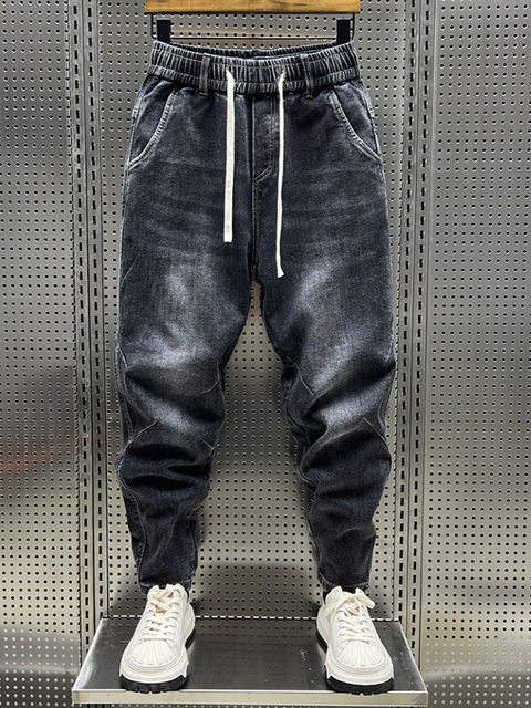 2023 ດູໃບໄມ້ລົ່ນ Pants ໃຫມ່ Trendy Brand Men's Jeans Elastic Waist Slimming Loose Leg-tie Casual Pants Harem