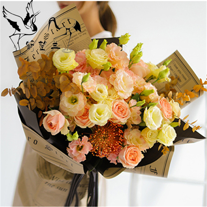 New flower wrapping paper two-color kraft Ouya paper bouquet packaging material English newspaper bouquet art wrapping paper