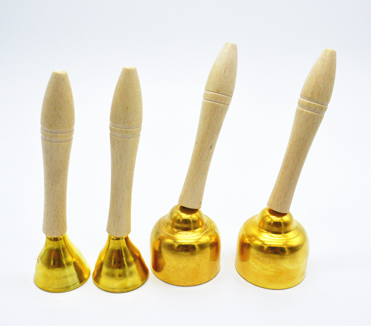 Orff trẻ em nhạc cụ gõ tay cầm đồng hồ cảm ứng đồng nguyên chất kích thước nhỏ với một thanh đồng hồ cảm ứng tay cầm bằng gỗ chuông đồng cảm ứng - Nhạc cụ dân tộc sáo ngọc