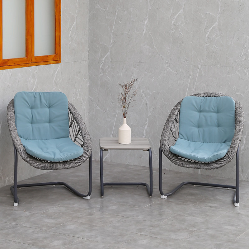 Rattan chair three-piece set balcony small table and chair Nordic leisure courtyard indoor light luxury sunscreen rattan rocking chair outdoor combination