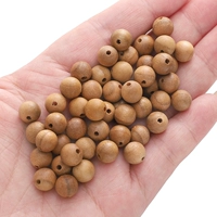 Красное дерево 8мм, диаметр отверстия около 1мм, в упаковке 50 шт.