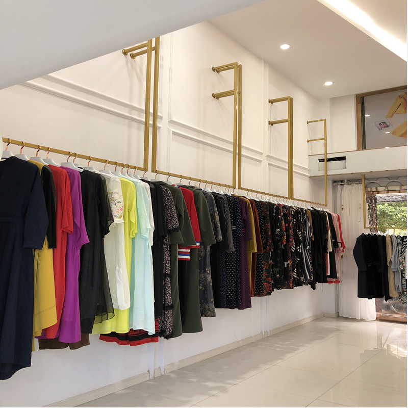Clothing store display rack on the wall hanging shop decoration gold clothes rack Women's clothing rack Children's clothing side pylons