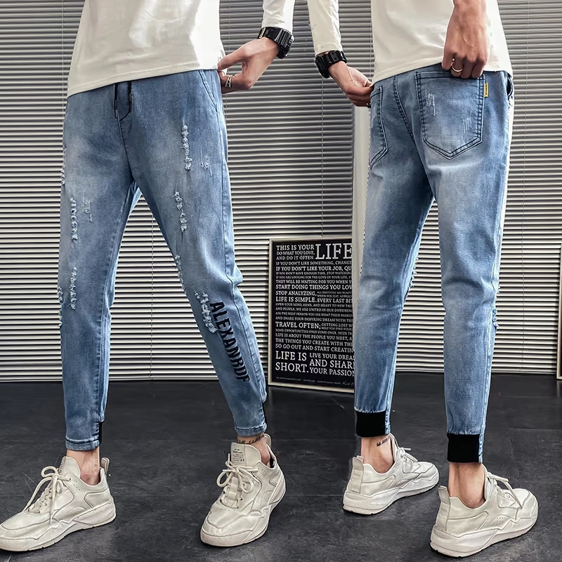 Mùa hè rách quần jeans nam Hàn Quốc Slim eo thon và chân Quần 9 điểm hợp thời trang quần Harlan ăn mày - Quần jean