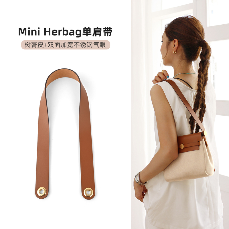 Transform the Miniherbag by Replacing the Original Leather Shoulder Strap with a Genuine Leather Handbag Strap, Underarm Strap, or Short Shoulder Strap Transform the Miniherbag by Replacing the Original Leather Shoulder Strap with a Genuine Leather Handbag Strap, Underarm Strap, or Short Shoulder Strap