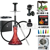 Бутылка с полупрозрачным узором и расходный уголь из скорлупы кокосового ореха.